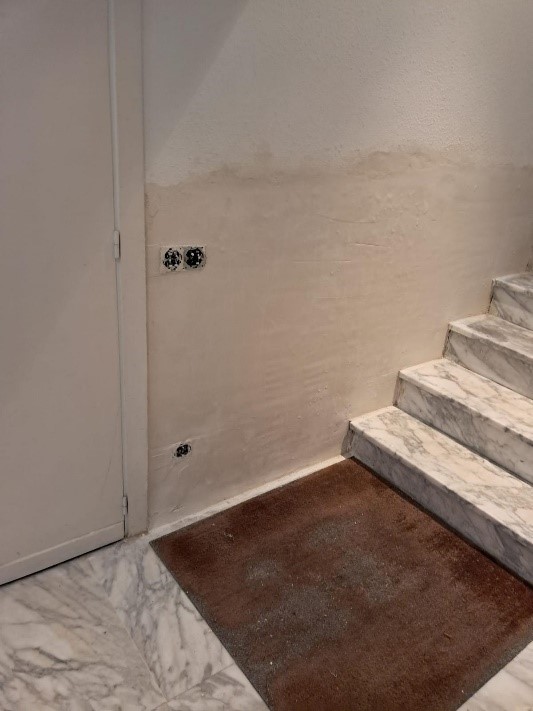 reparación pared portal